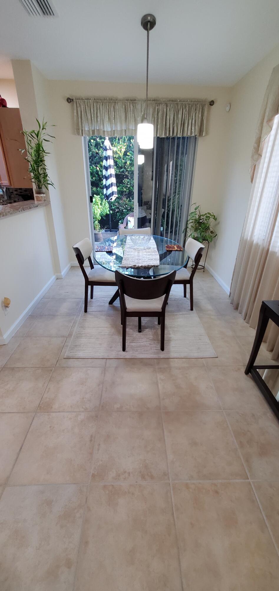 3195 Laurel Ridge Circle Riviera Beach, FL 33404 - Photo 14 of 52 dining area