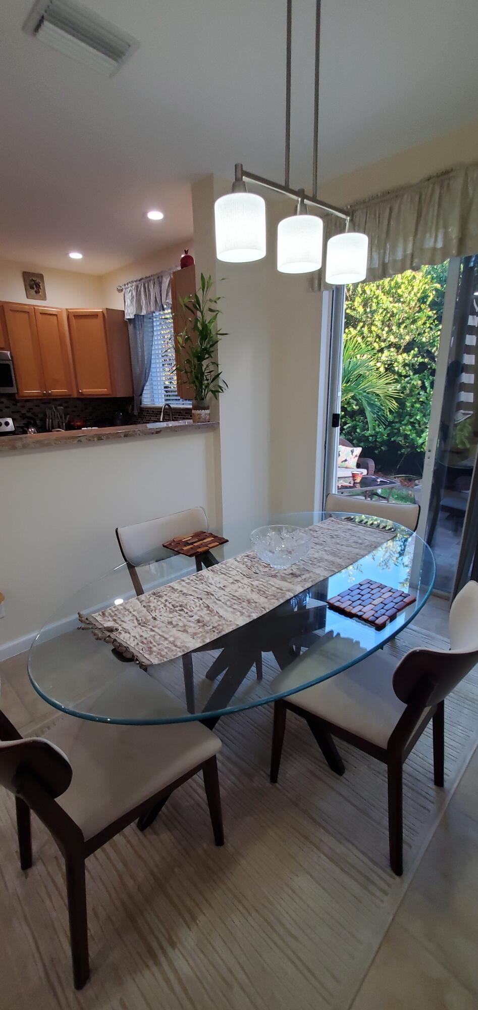3195 Laurel Ridge Circle Riviera Beach, FL 33404 - Photo 15 of 52 dining fixture