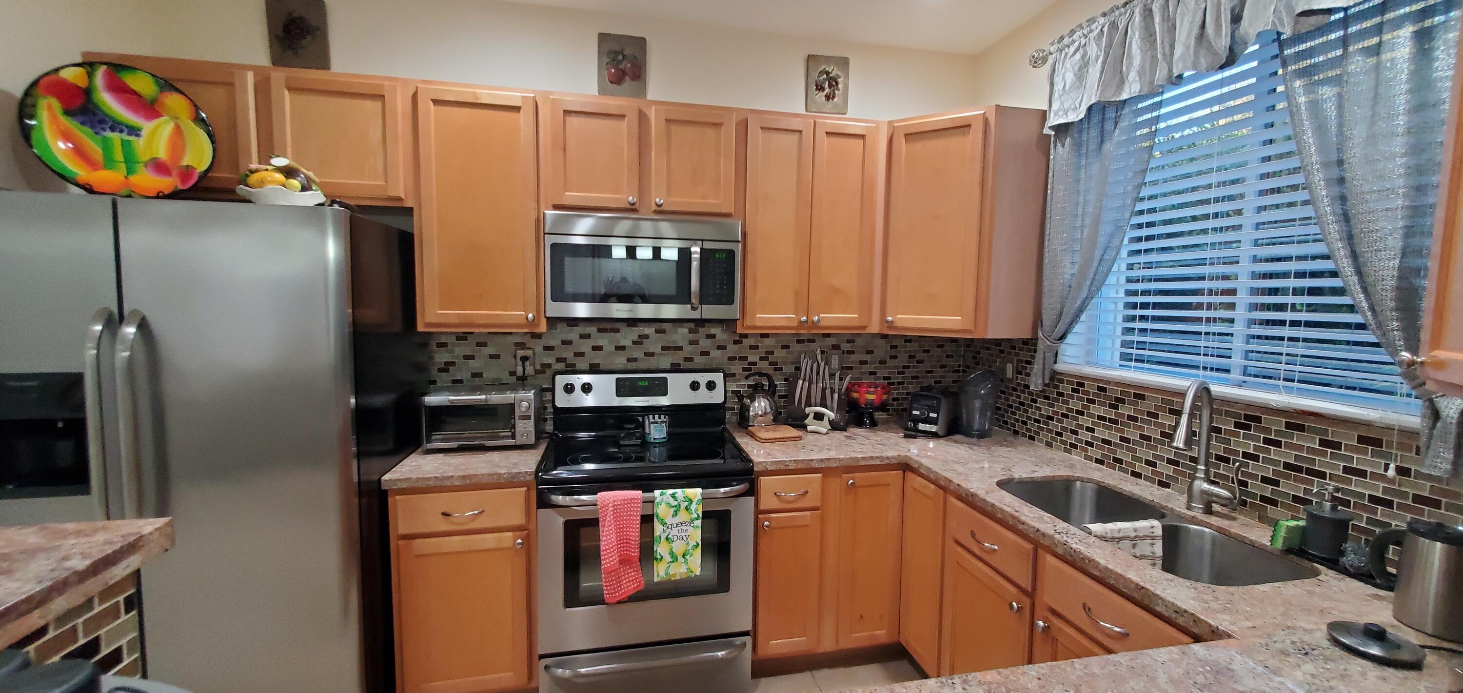 3195 Laurel Ridge Circle Riviera Beach, FL 33404 - Photo 19 of 52 Wide Gally style Kitchen