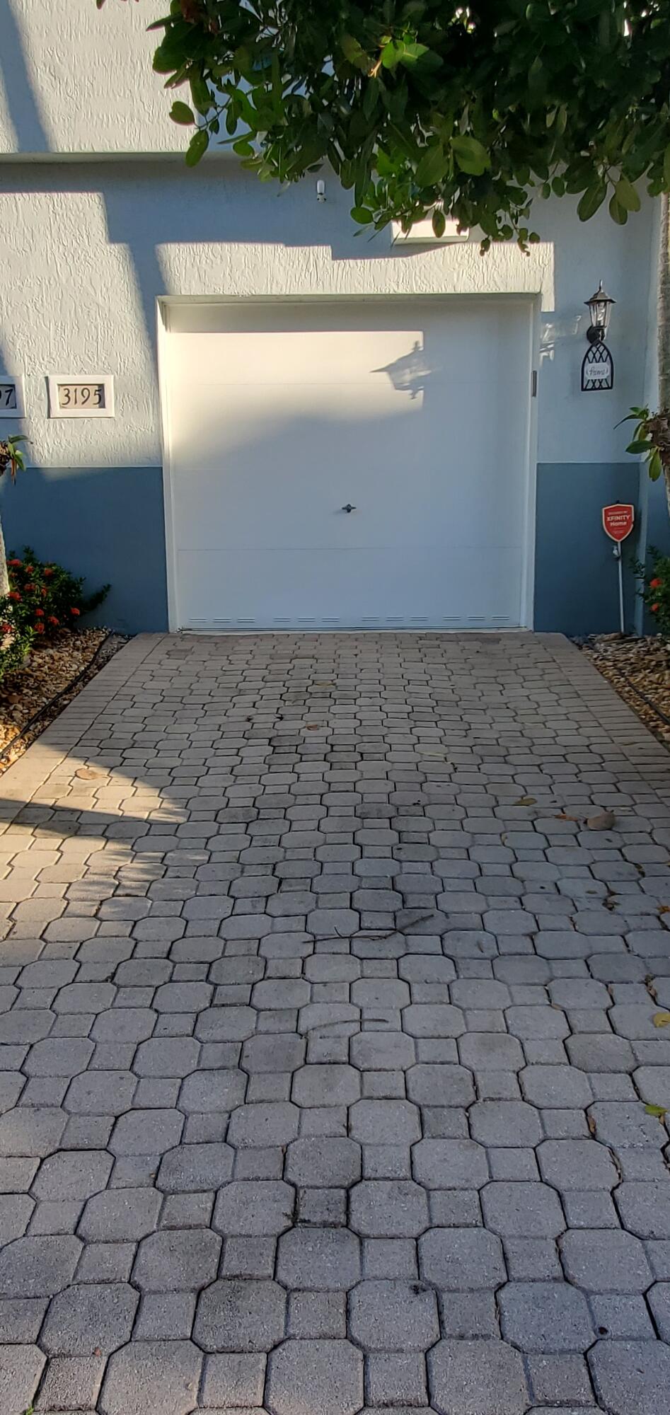 3195 Laurel Ridge Circle Riviera Beach, FL 33404 - Photo 2 of 52 Driveway