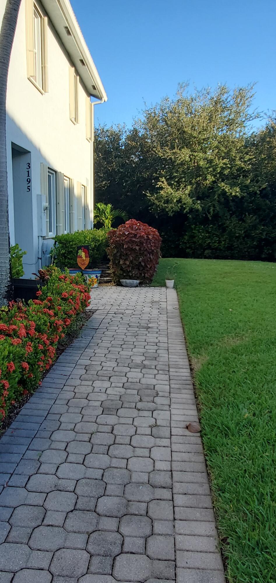 3195 Laurel Ridge Circle Riviera Beach, FL 33404 - Photo 3 of 52 Walkway