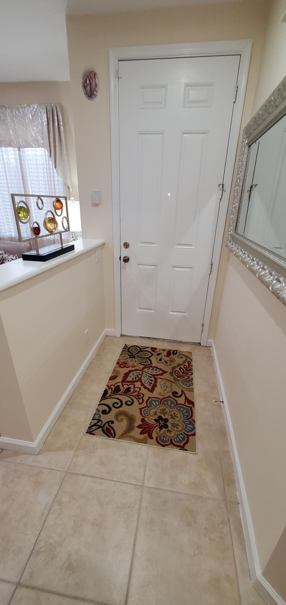 3195 Laurel Ridge Circle Riviera Beach, FL 33404 - Photo 5 of 52 entrance