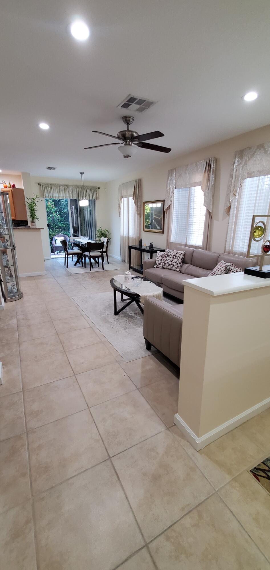 3195 Laurel Ridge Circle Riviera Beach, FL 33404 - Photo 10 of 52 Flowy open concept