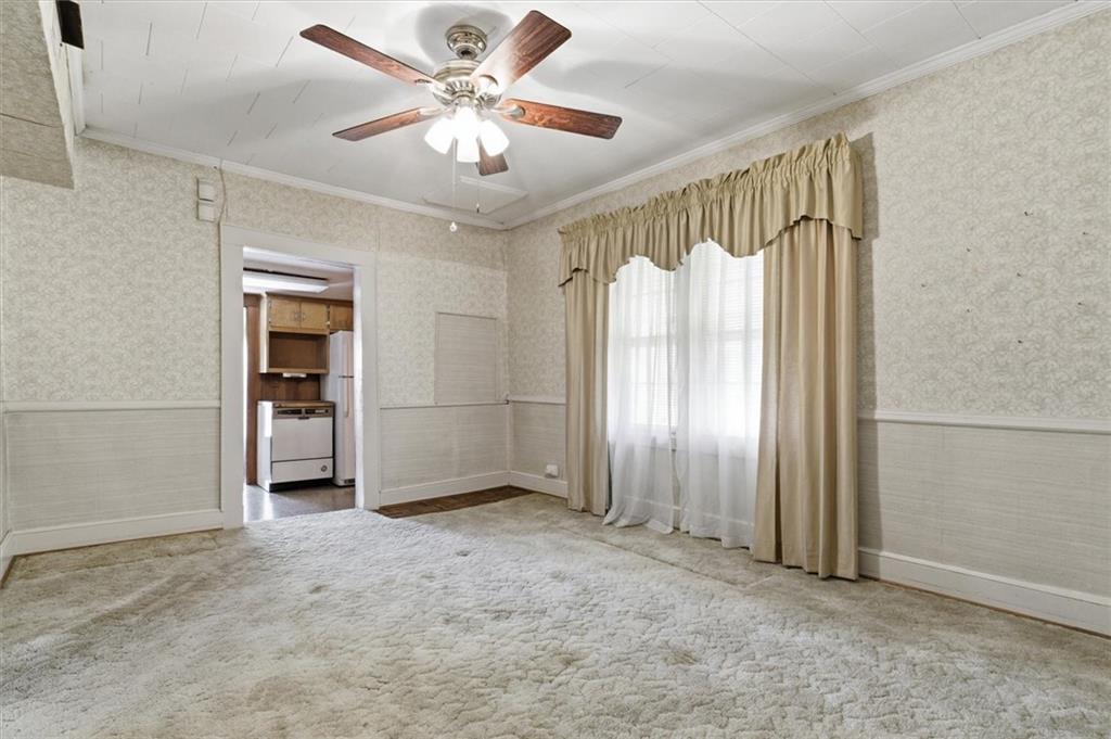 870 Marietta Road Canton, GA 30114 - Photo 12 of 43 wooden floor in an empty room with a window