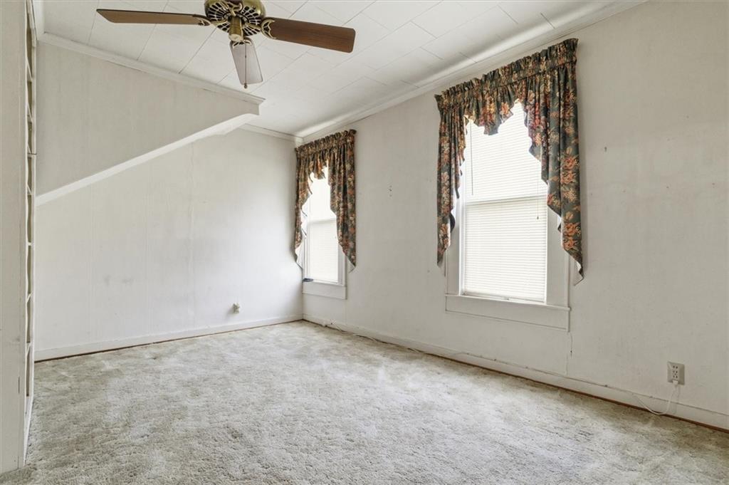 870 Marietta Road Canton, GA 30114 - Photo 14 of 43 an empty room with windows and fan