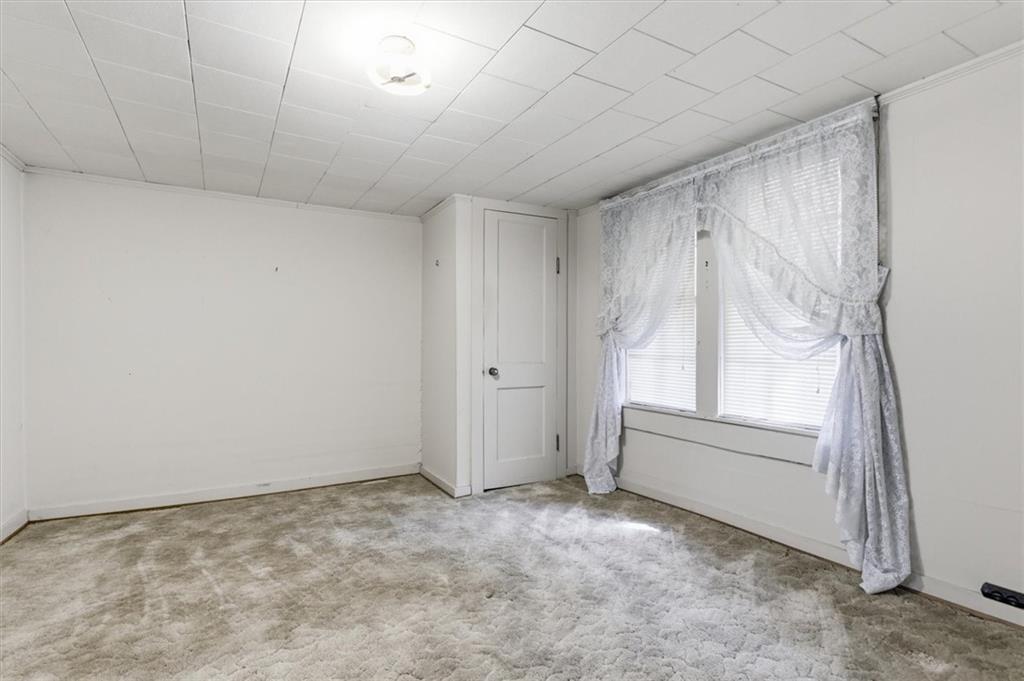 870 Marietta Road Canton, GA 30114 - Photo 21 of 43 a view of an empty room with a window