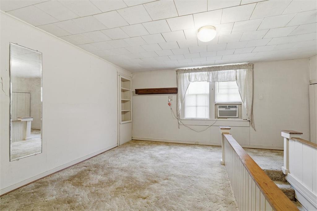 870 Marietta Road Canton, GA 30114 - Photo 22 of 43 a view of an empty room with a window