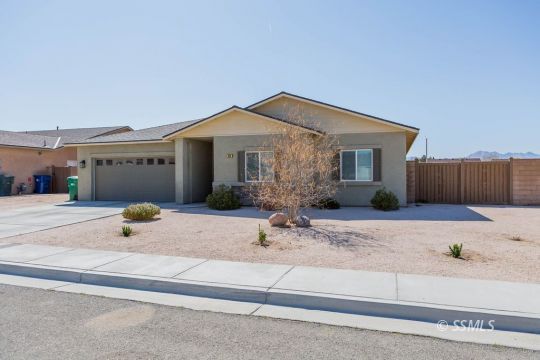 411 Abigail Street Ridgecrest, CA 93555 - Photo 4 of 39 a view of a house with a outdoor space