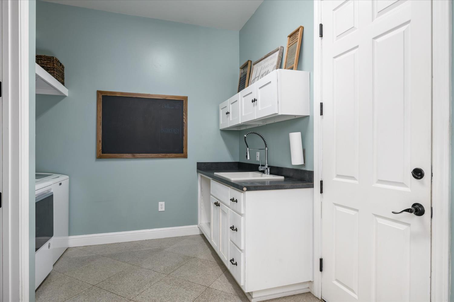 5880 Bumper Road El Dorado, CA 95623 - Photo 18 of 71 a kitchen with stainless steel appliances a white stove top oven and a refrigerator