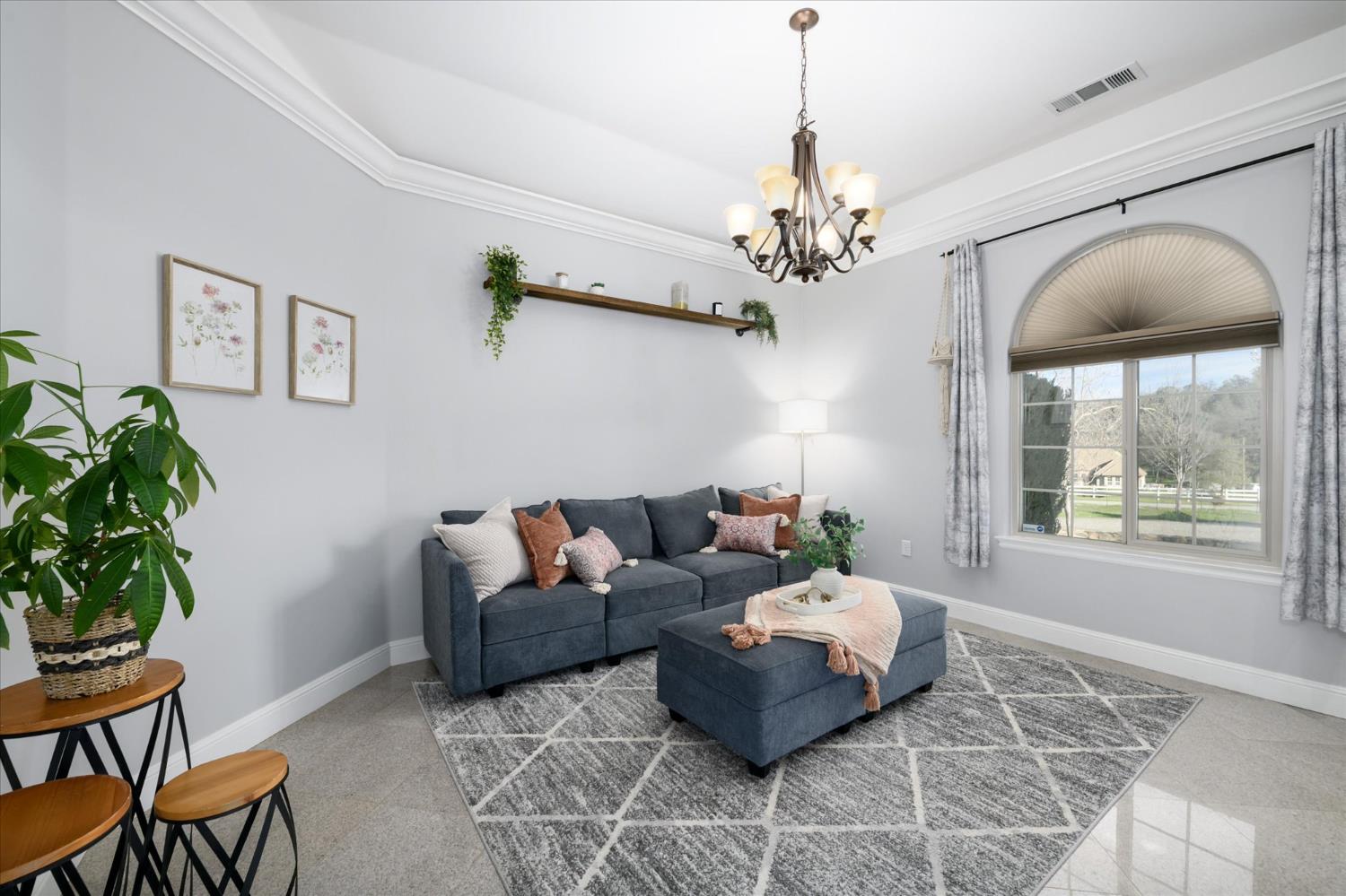 5880 Bumper Road El Dorado, CA 95623 - Photo 19 of 71 a living room with furniture chandelier and a chandelier