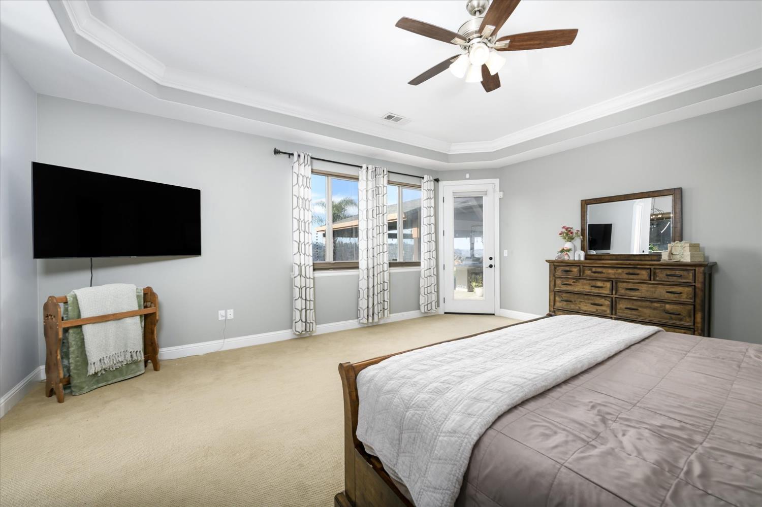 5880 Bumper Road El Dorado, CA 95623 - Photo 23 of 71 a bedroom with a bed and a flat screen tv