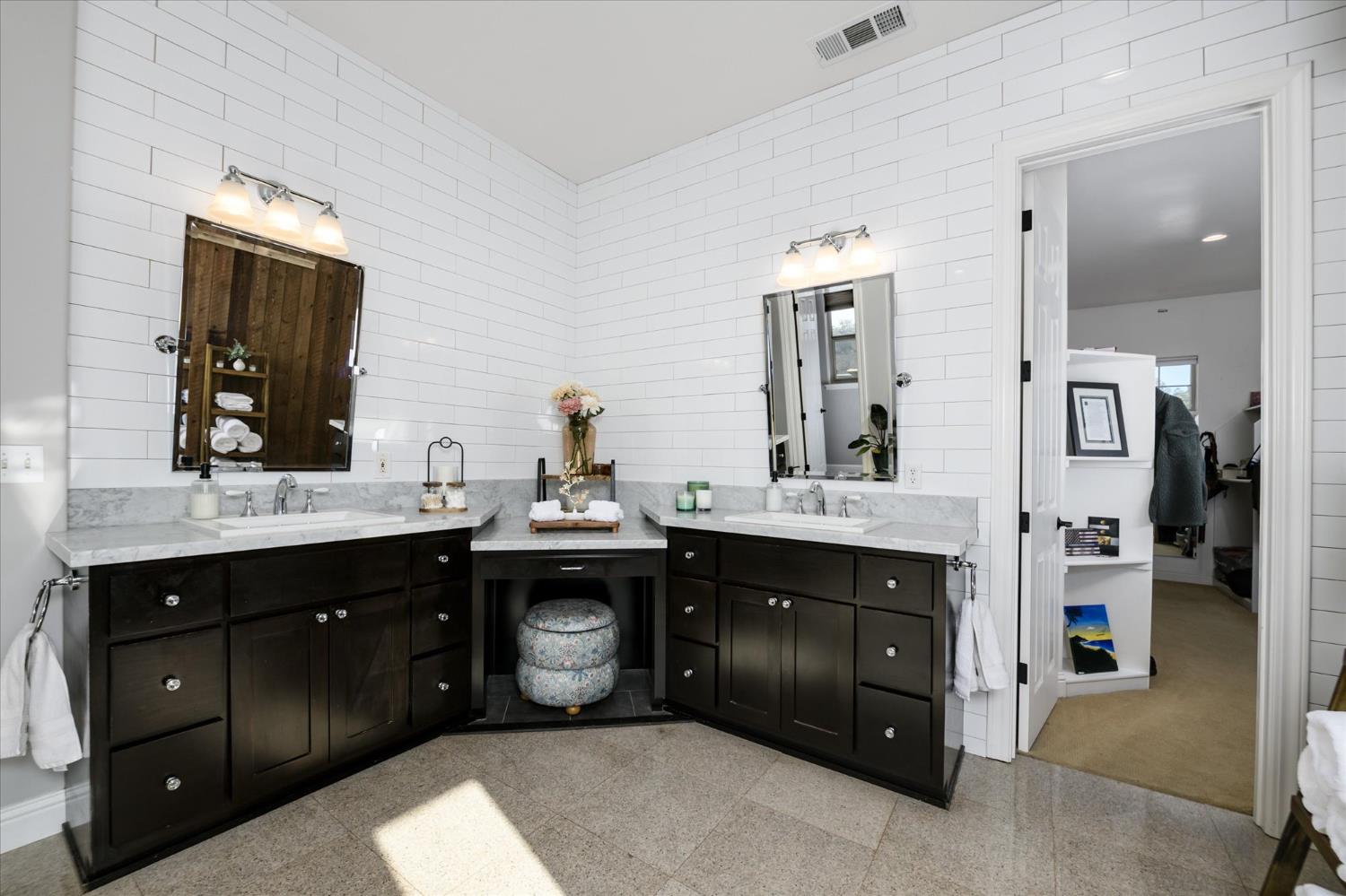 5880 Bumper Road El Dorado, CA 95623 - Photo 28 of 71 a bathroom with a sink double vanity and a mirror