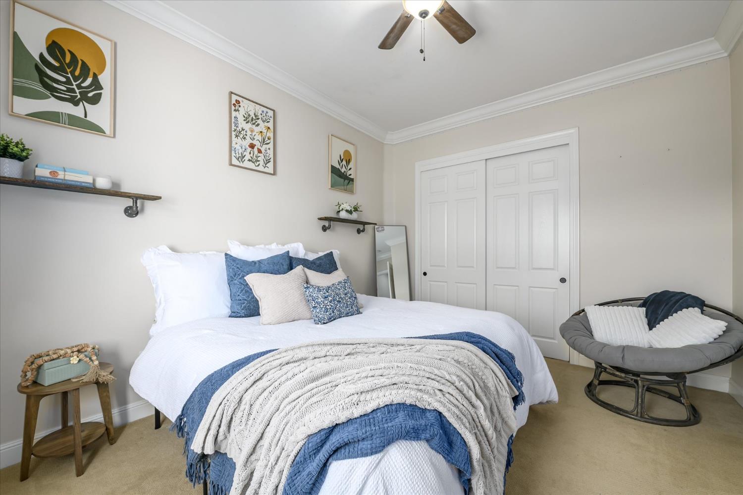 5880 Bumper Road El Dorado, CA 95623 - Photo 32 of 71 a bedroom with a bed and a chandelier