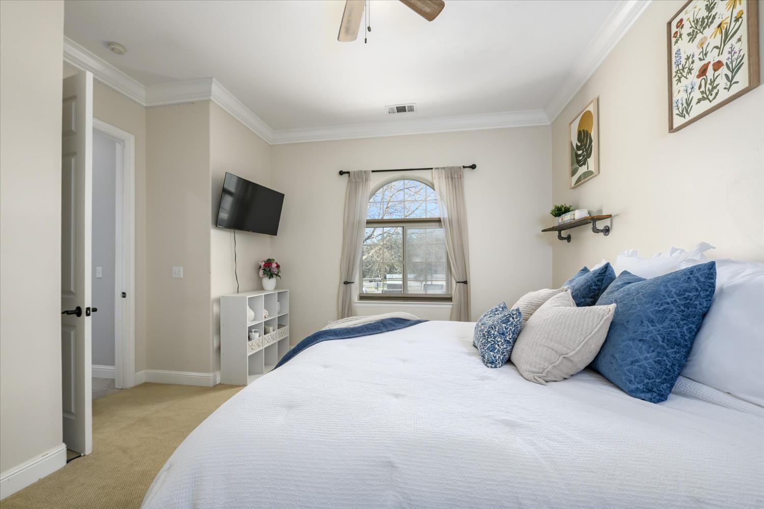 5880 Bumper Road El Dorado, CA 95623 - Photo 33 of 71 a spacious bedroom with a bed and a window