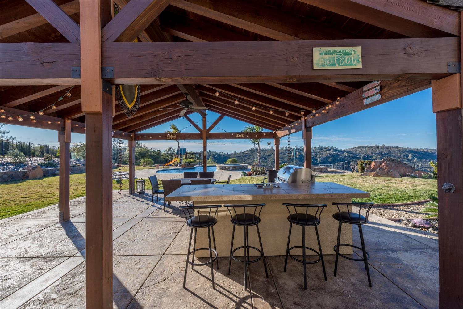 5880 Bumper Road El Dorado, CA 95623 - Photo 38 of 71 a patio with a table and chairs