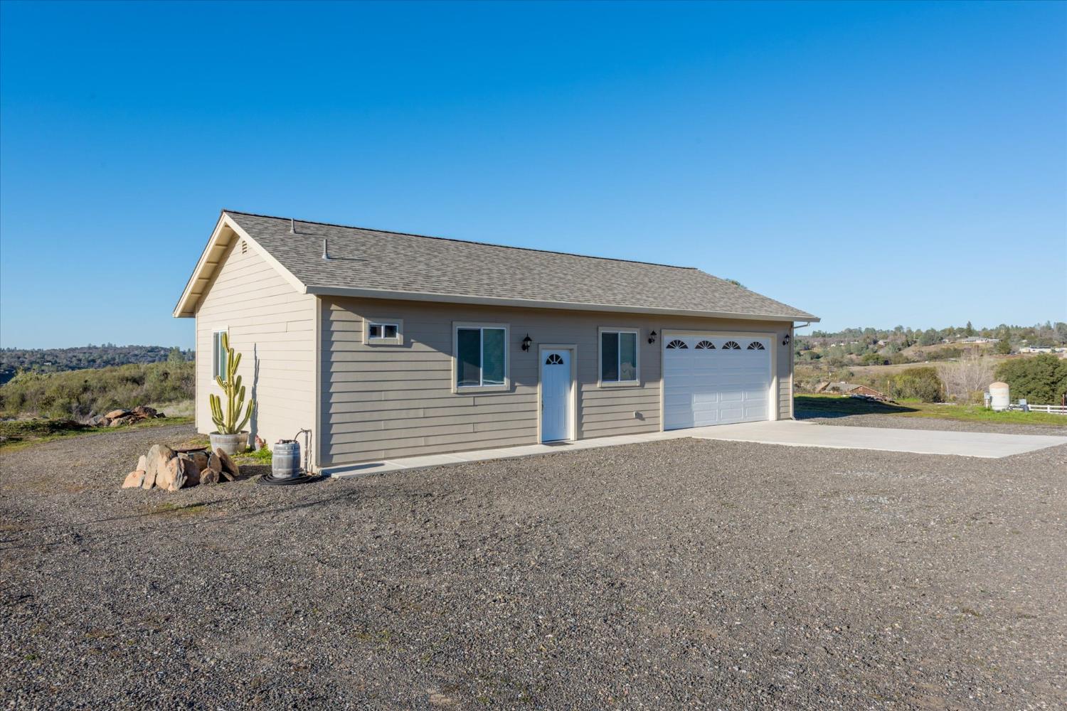 5880 Bumper Road El Dorado, CA 95623 - Photo 49 of 71 a view of a house with a backyard