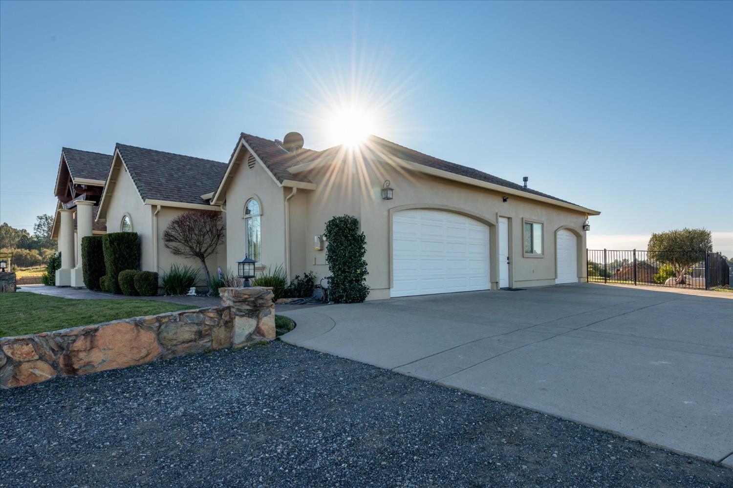 5880 Bumper Road El Dorado, CA 95623 - Photo 5 of 71 a front view of a house with swing and furniture