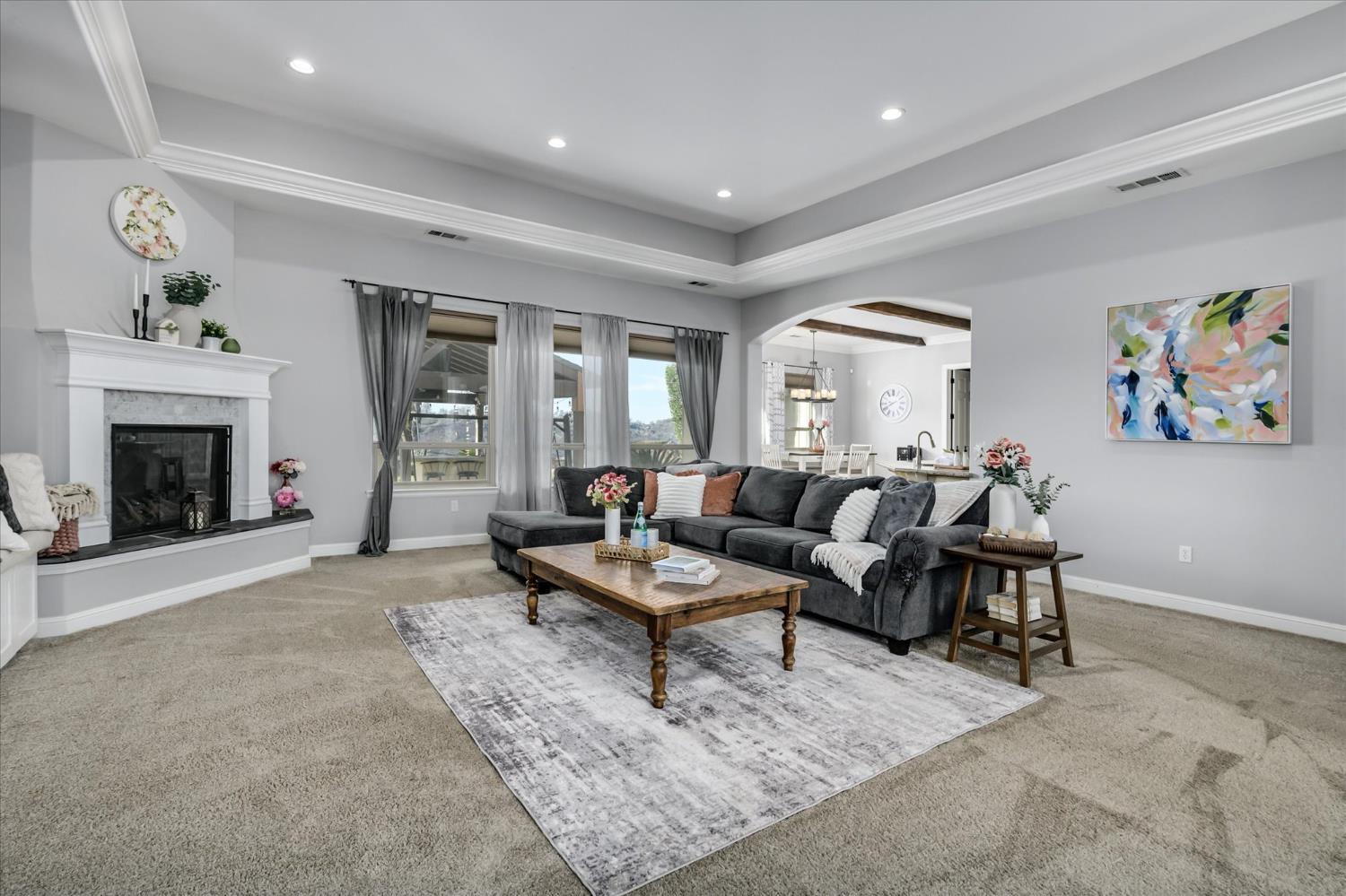 5880 Bumper Road El Dorado, CA 95623 - Photo 9 of 71 a living room with furniture and a fireplace