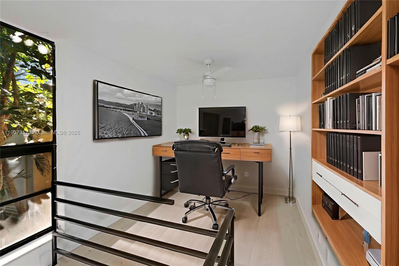 2778 Day Avenue, Unit 2 Miami, FL 33133 - Photo 5 of 21 a view of a workspace with furniture and a window