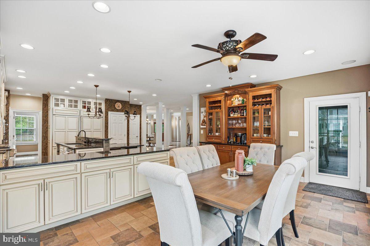 4100 Hidden Creek Road Port Republic, MD 20676 - Photo 47 of 99 The whole kitchen space, access to porch and pool