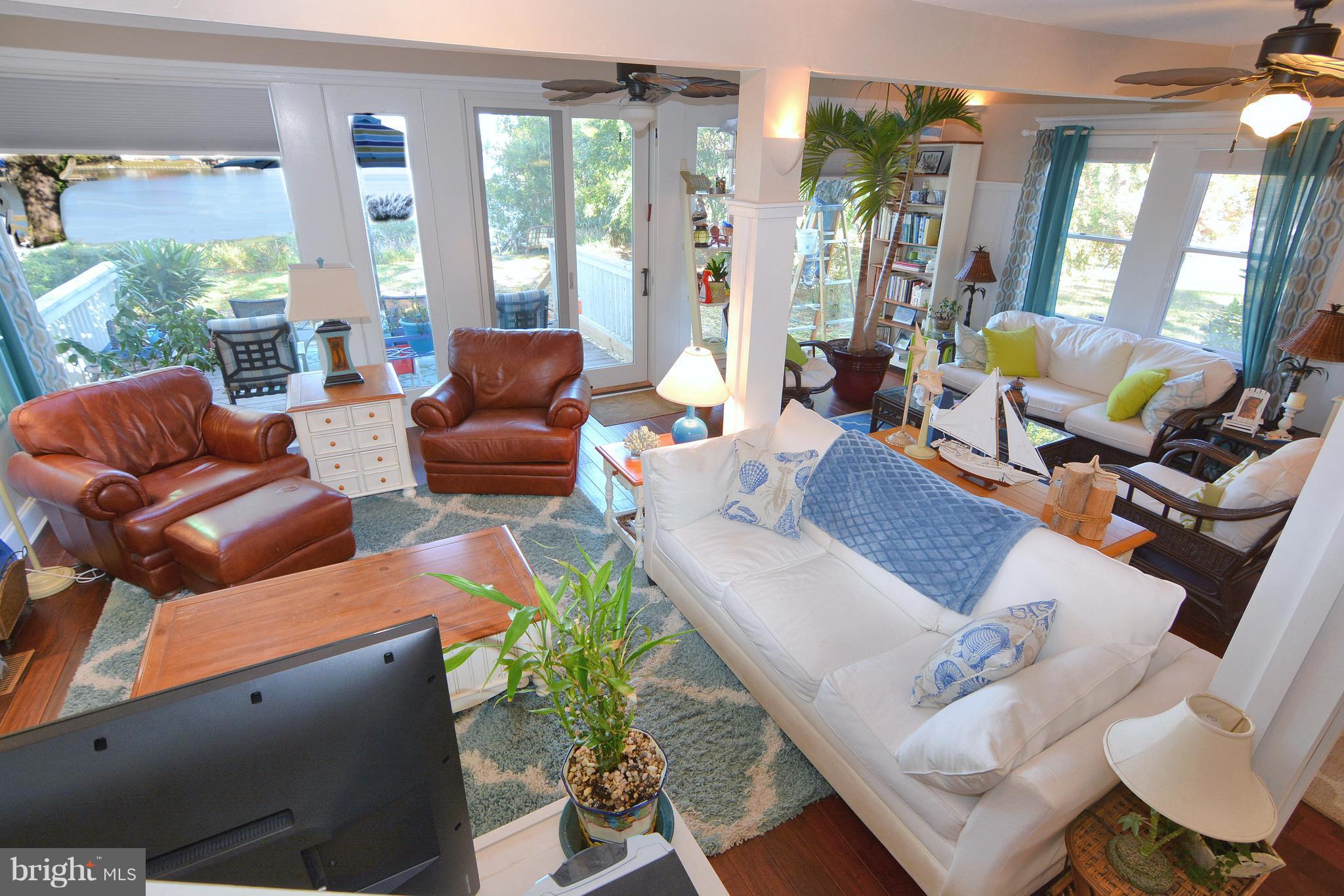 1308 N Road Pasadena, MD 21122 - Photo 14 of 30 Living Room with a view and sliders to deck