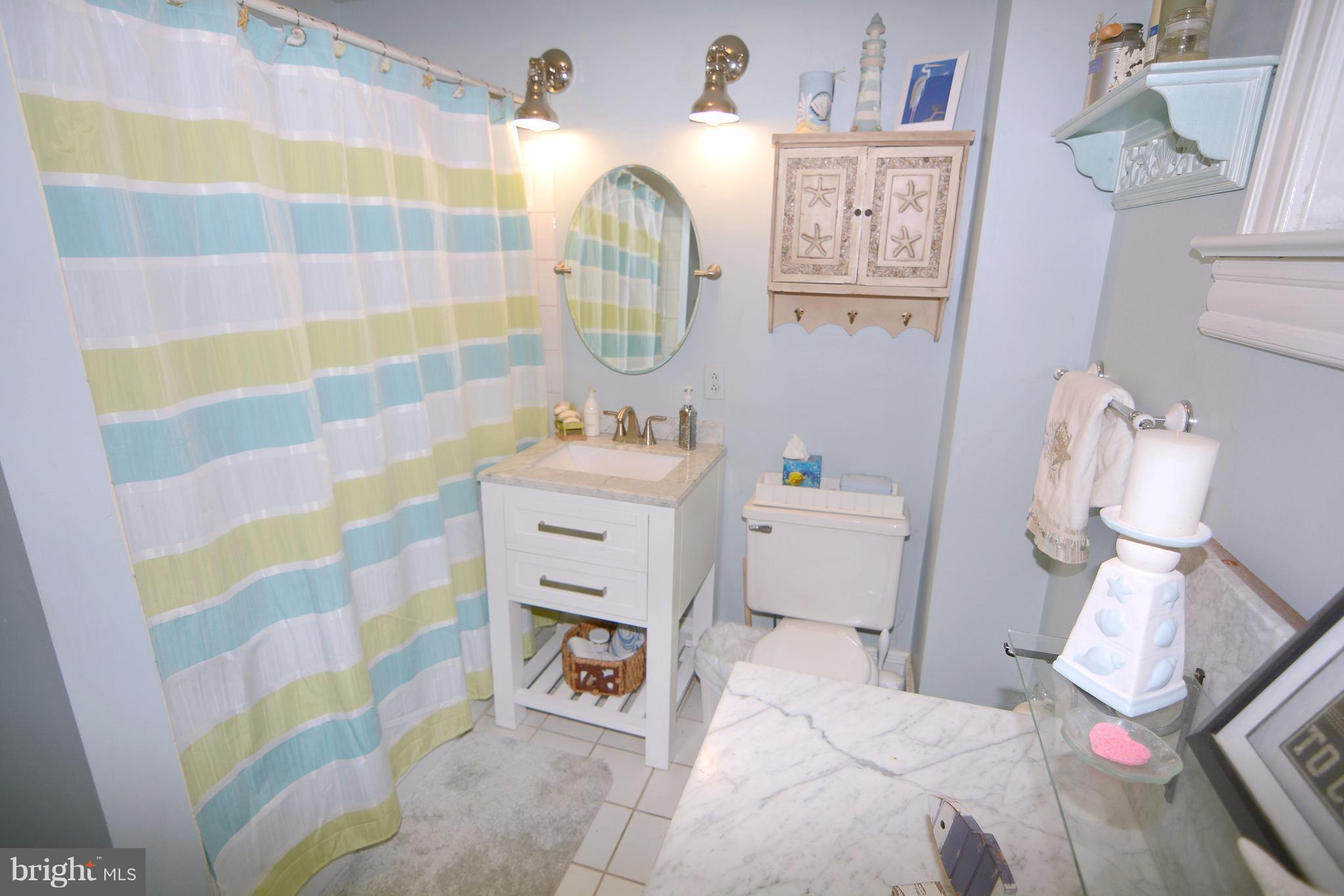 1308 N Road Pasadena, MD 21122 - Photo 17 of 30 Charming bath with Pottery Barn style