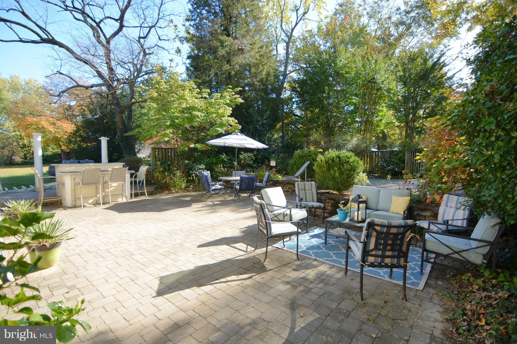 1308 N Road Pasadena, MD 21122 - Photo 29 of 30 Lush landscaping and professional hardscaping
