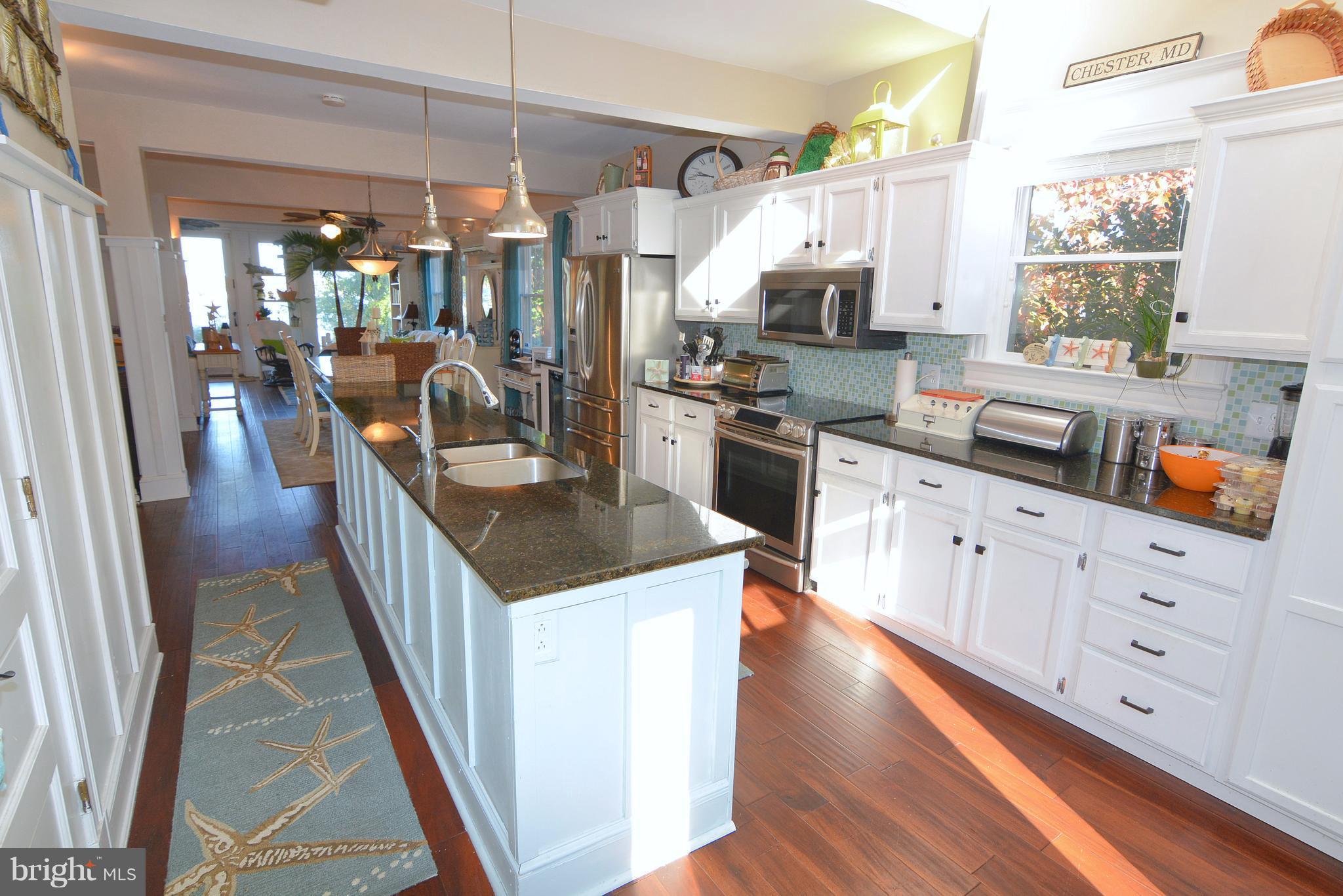 1308 N Road Pasadena, MD 21122 - Photo 8 of 30 Remodeled kitchen with granite countertops