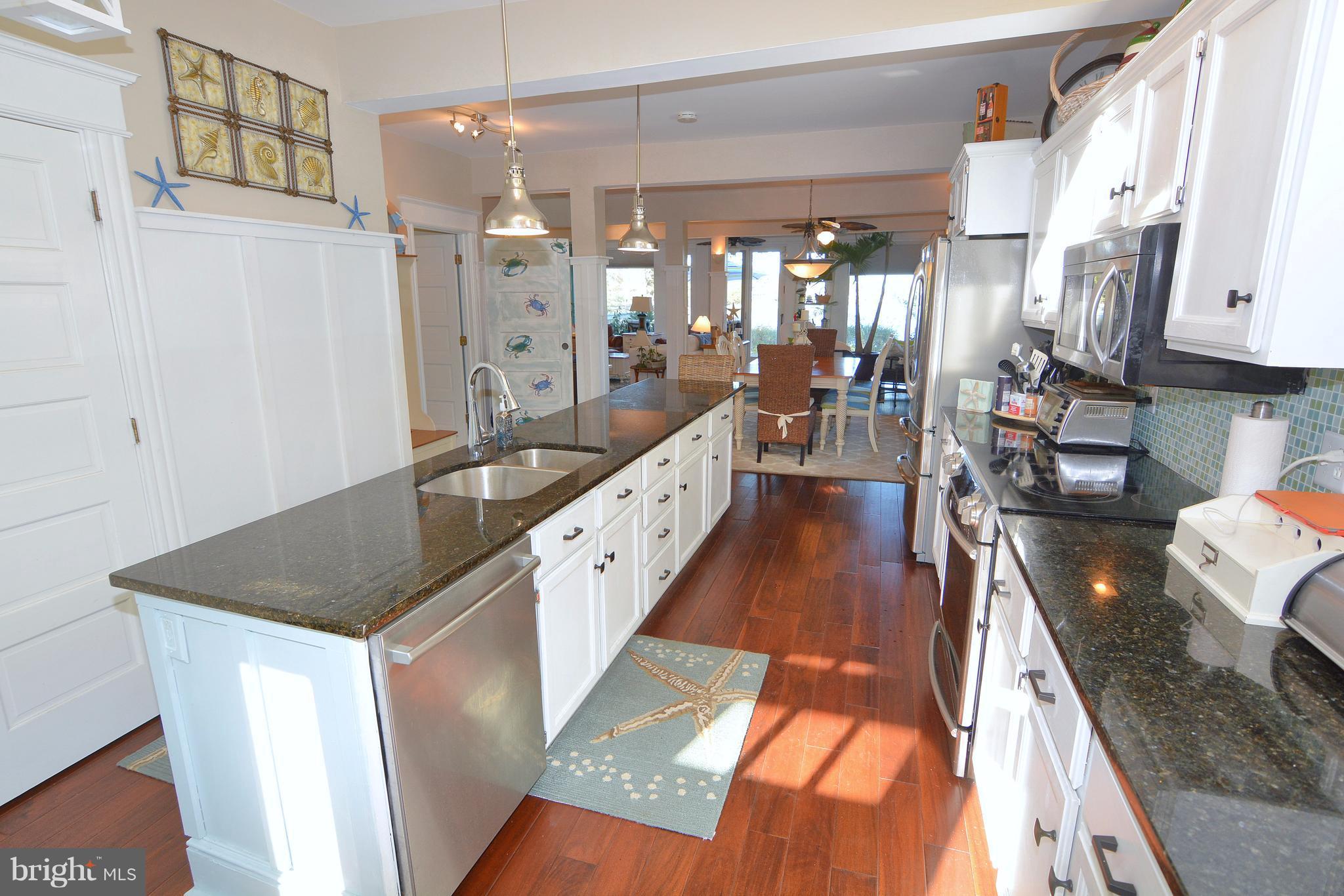 1308 N Road Pasadena, MD 21122 - Photo 9 of 30 Center island with pendant lighting