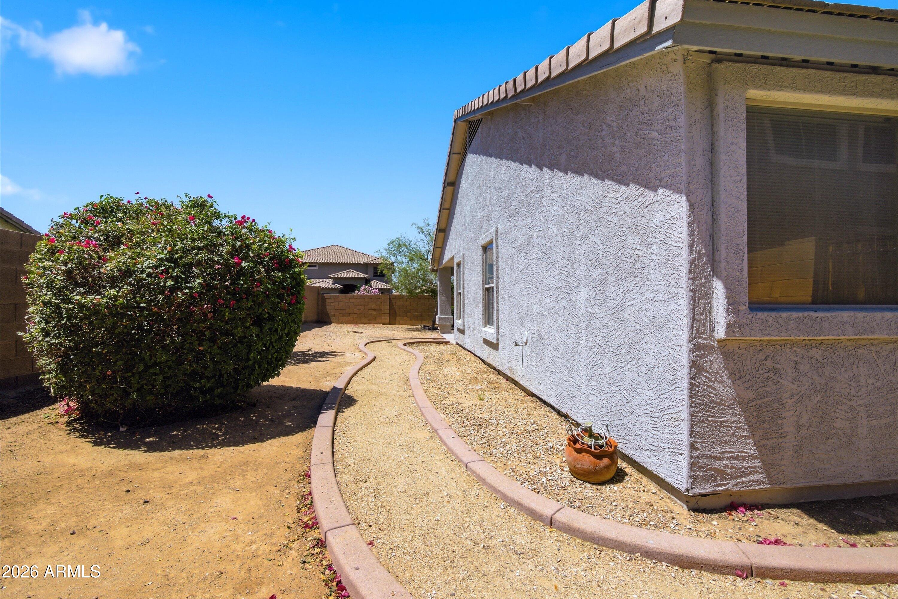 2933 West Maldonado Road Phoenix, AZ 85041 - Photo 27 of 27 a view of a house with a backyard