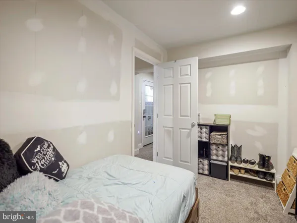 a bedroom with a bed and furniture