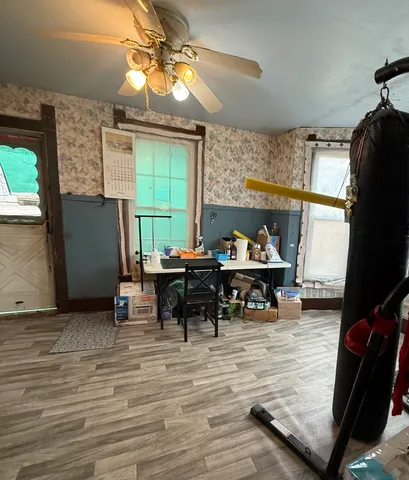 a view of a dining room with furniture window and outside view