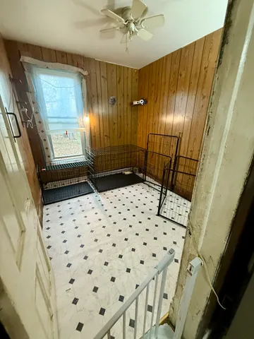 a bathroom with a sink a toilet a mirror and shower