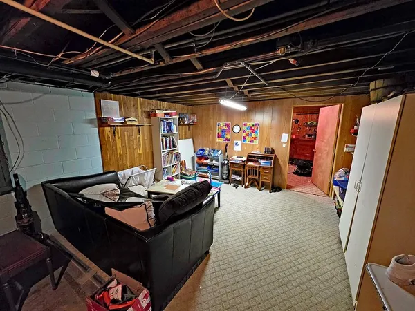 a living room with furniture and a table