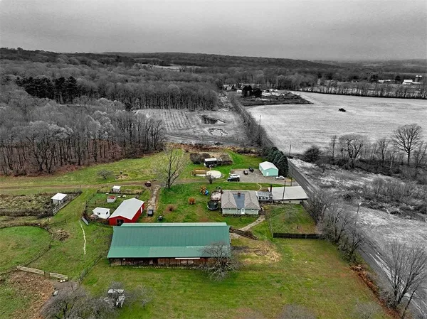 an aerial view of a house with a garden