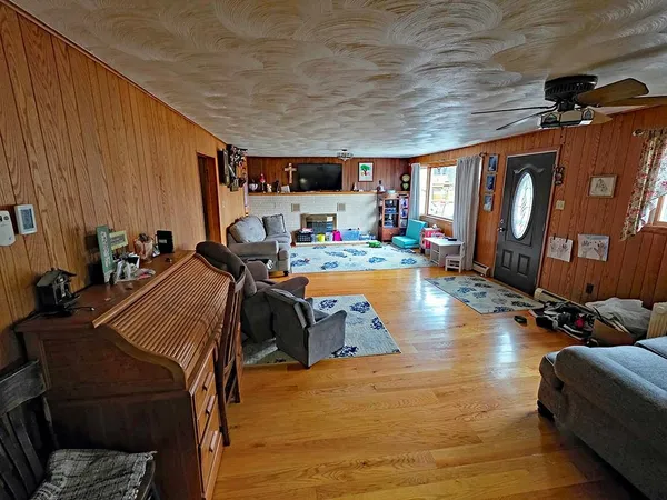 a room with gym equipment and a large window