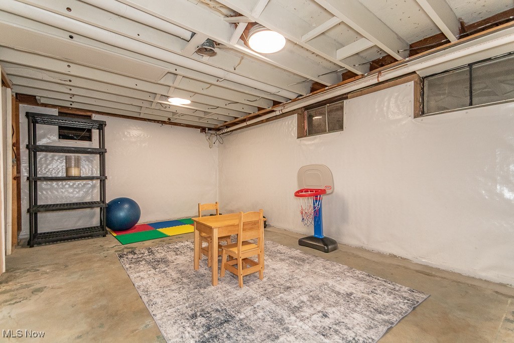 33 Woodside Road Chagrin Falls, OH 44022 - Photo 38 of 48 Game room featuring concrete flooring