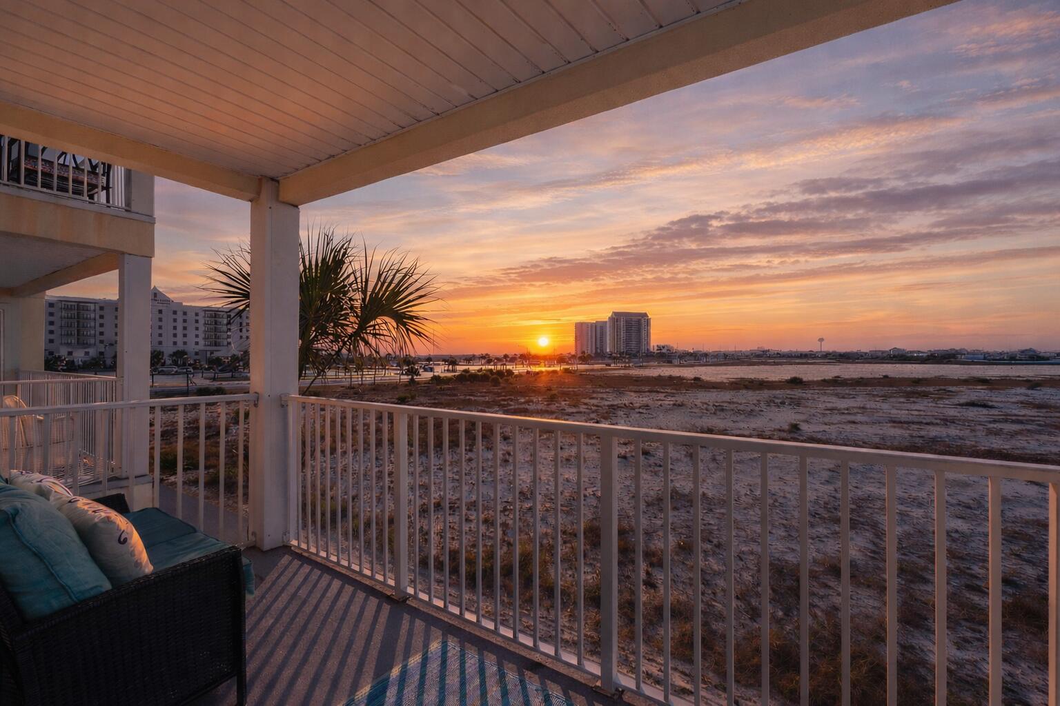 8436 Gulf Boulevard, Unit 321 Navarre, FL 32566 - Photo 1 of 57 a view of a balcony with furniture