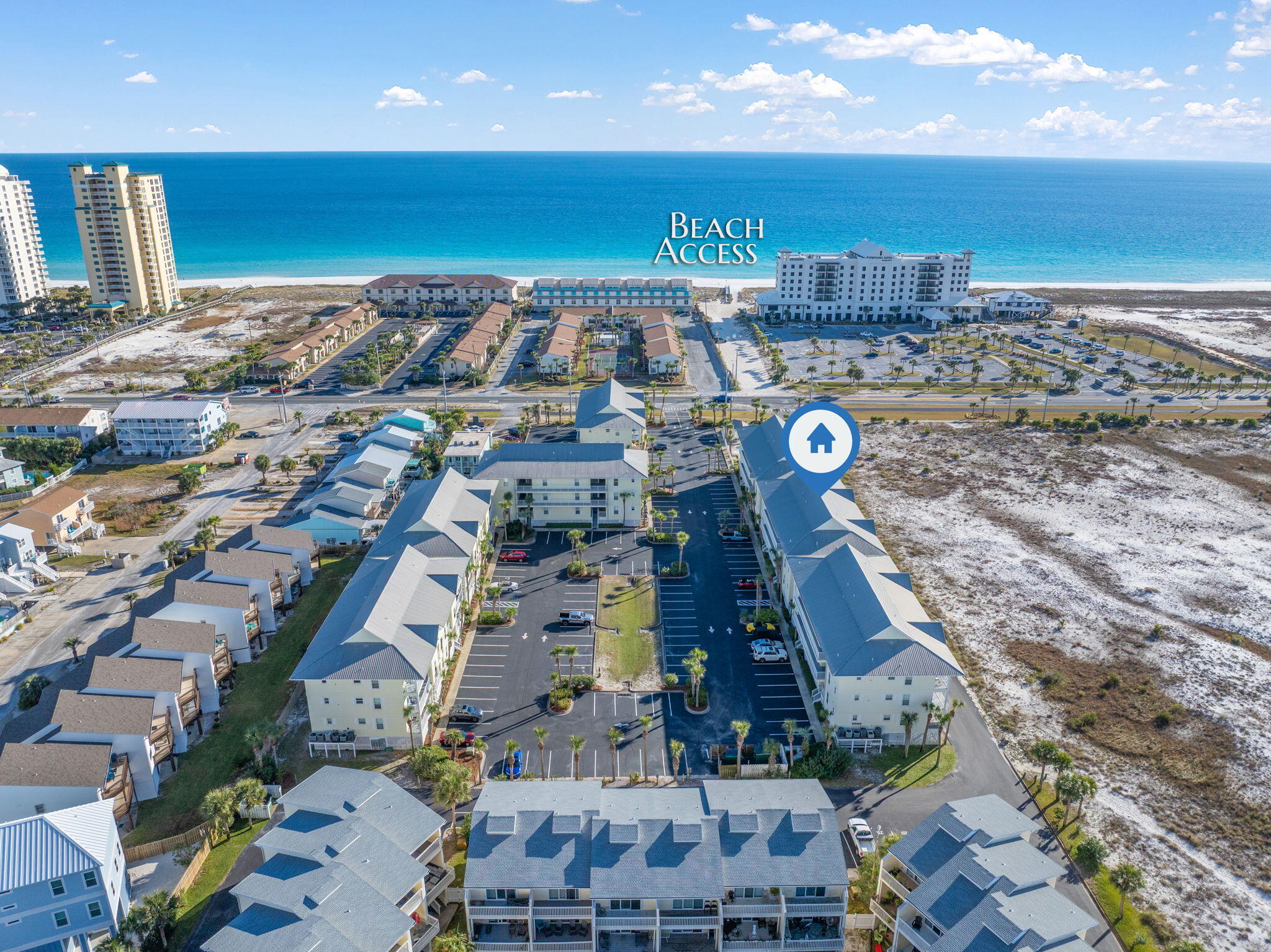 8436 Gulf Boulevard, Unit 321 Navarre, FL 32566 - Photo 3 of 57 a view of residential houses with outdoor space