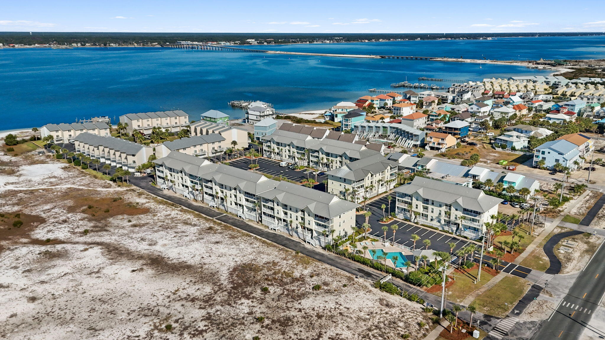 8436 Gulf Boulevard, Unit 321 Navarre, FL 32566 - Photo 39 of 57 a view of a city and ocean view