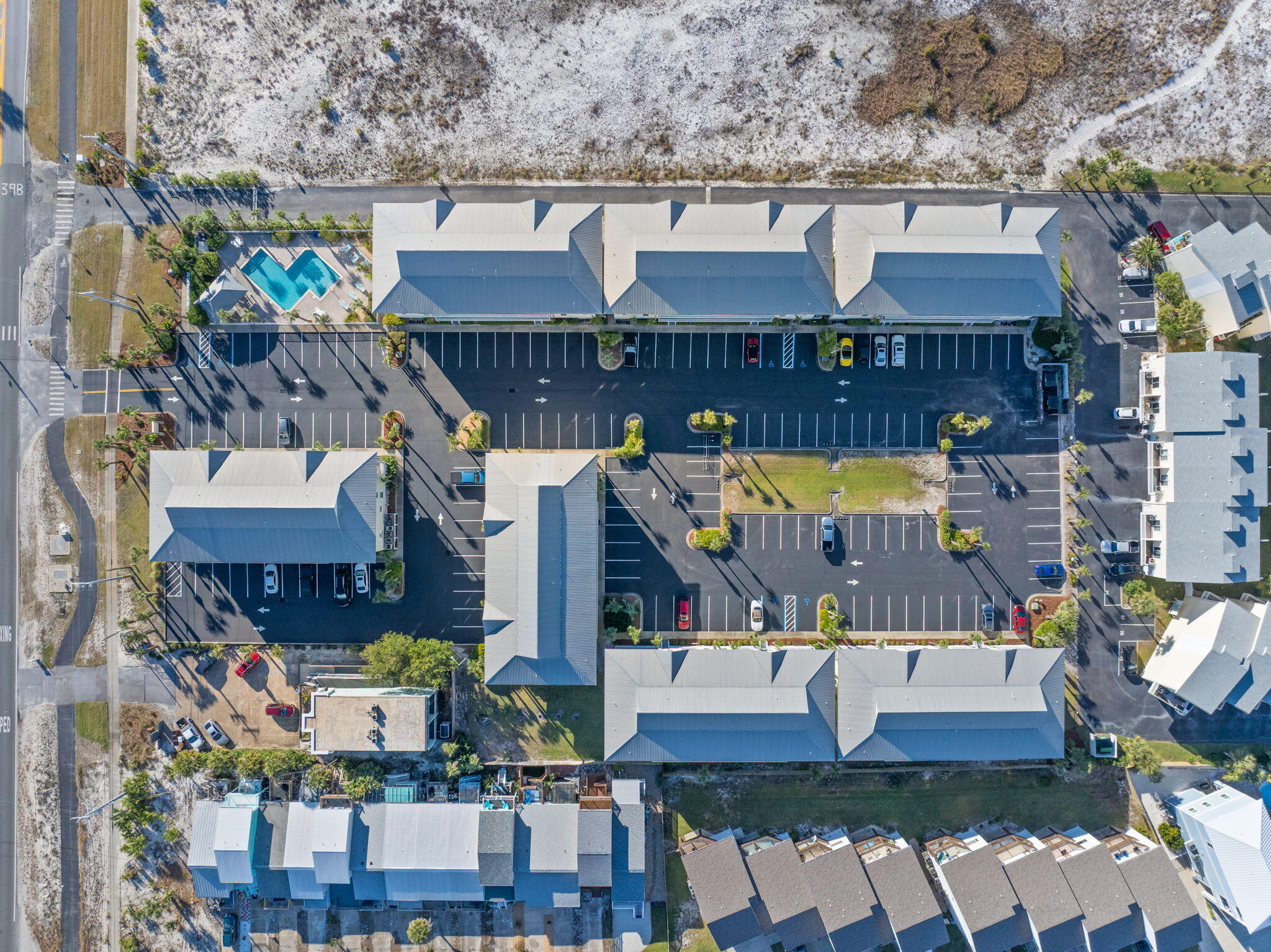 8436 Gulf Boulevard, Unit 321 Navarre, FL 32566 - Photo 8 of 57 a view of building and outdoor space