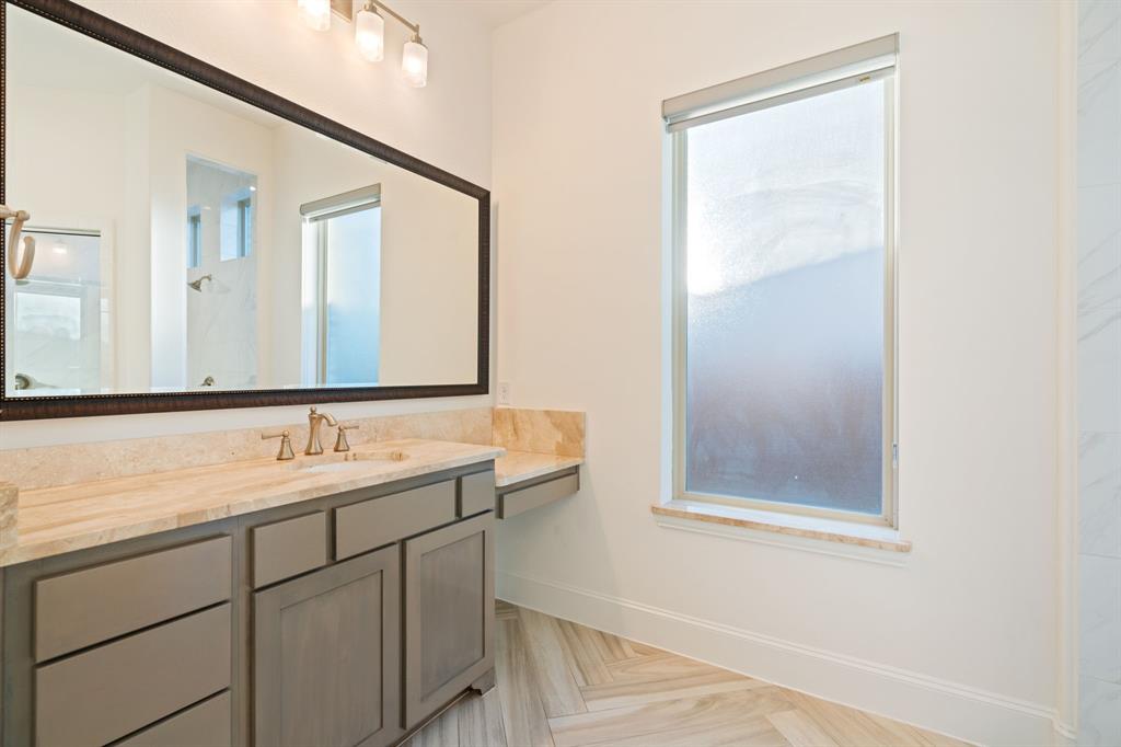 2441 Flat Creek Road Frisco, TX 75036 - Photo 19 of 34 Bathroom with baseboards and vanity