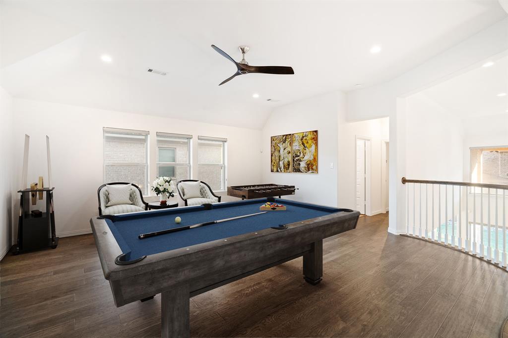 2441 Flat Creek Road Frisco, TX 75036 - Photo 21 of 34 Recreation room featuring vaulted ceiling, dark wood-style floors, recessed lighting, pool table, and a ceiling fan