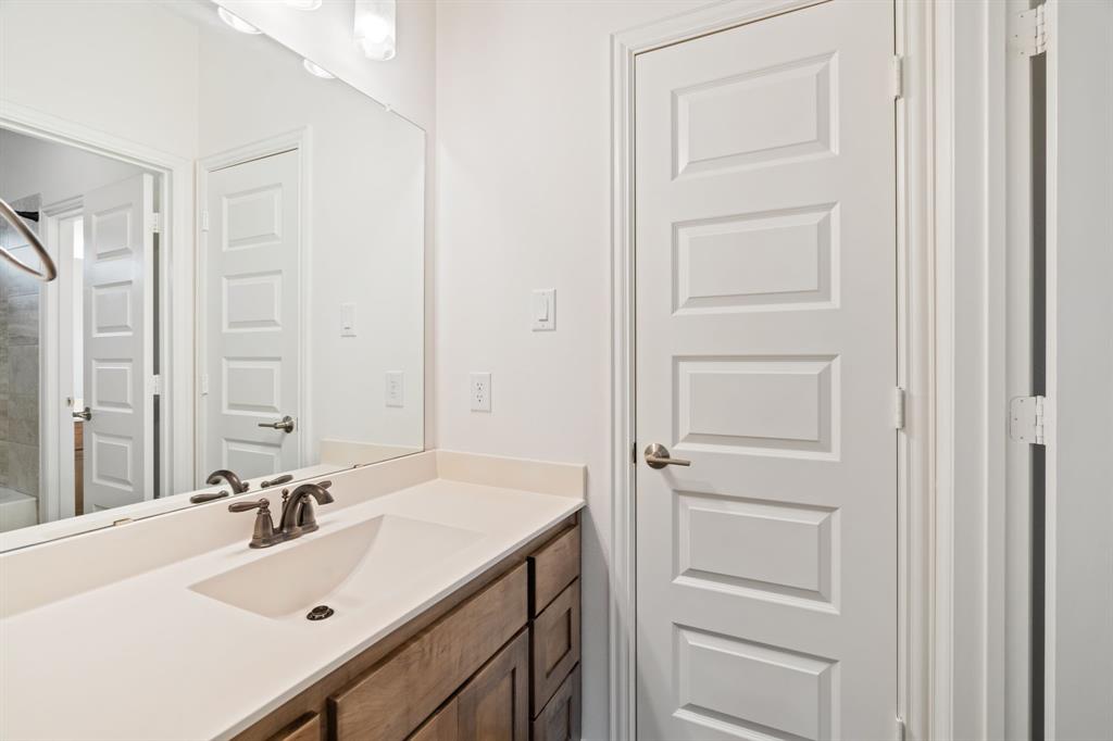 2441 Flat Creek Road Frisco, TX 75036 - Photo 26 of 34 Full bath featuring vanity and shower / bathtub combination