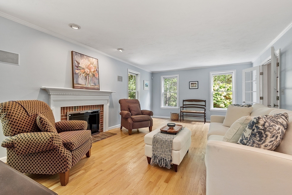 9 Blanchard Road Harvard, MA 01451 - Photo 14 of 33 a living room with furniture and a fireplace