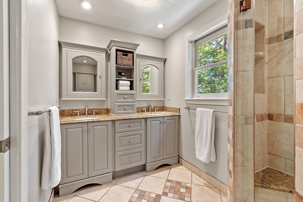 9 Blanchard Road Harvard, MA 01451 - Photo 19 of 33 a spacious bathroom with a mirror a sink and a shower