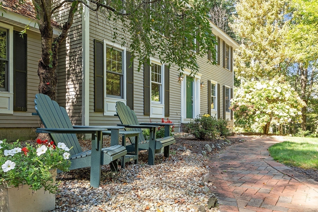 9 Blanchard Road Harvard, MA 01451 - Photo 31 of 33 a backyard of a house with seating space