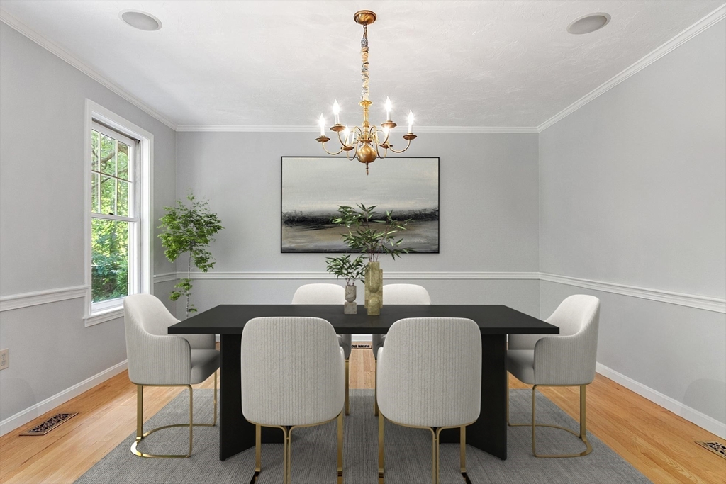 9 Blanchard Road Harvard, MA 01451 - Photo 4 of 33 a view of a dining room with furniture and chandelier