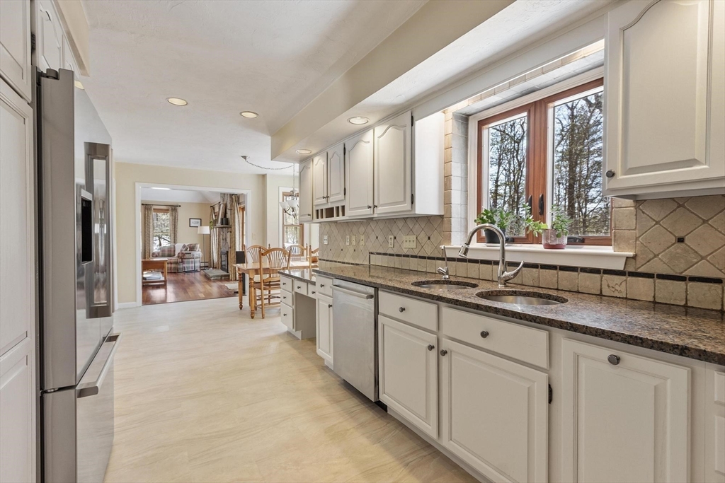 9 Blanchard Road Harvard, MA 01451 - Photo 10 of 33 a kitchen with lots of counter top space and windows
