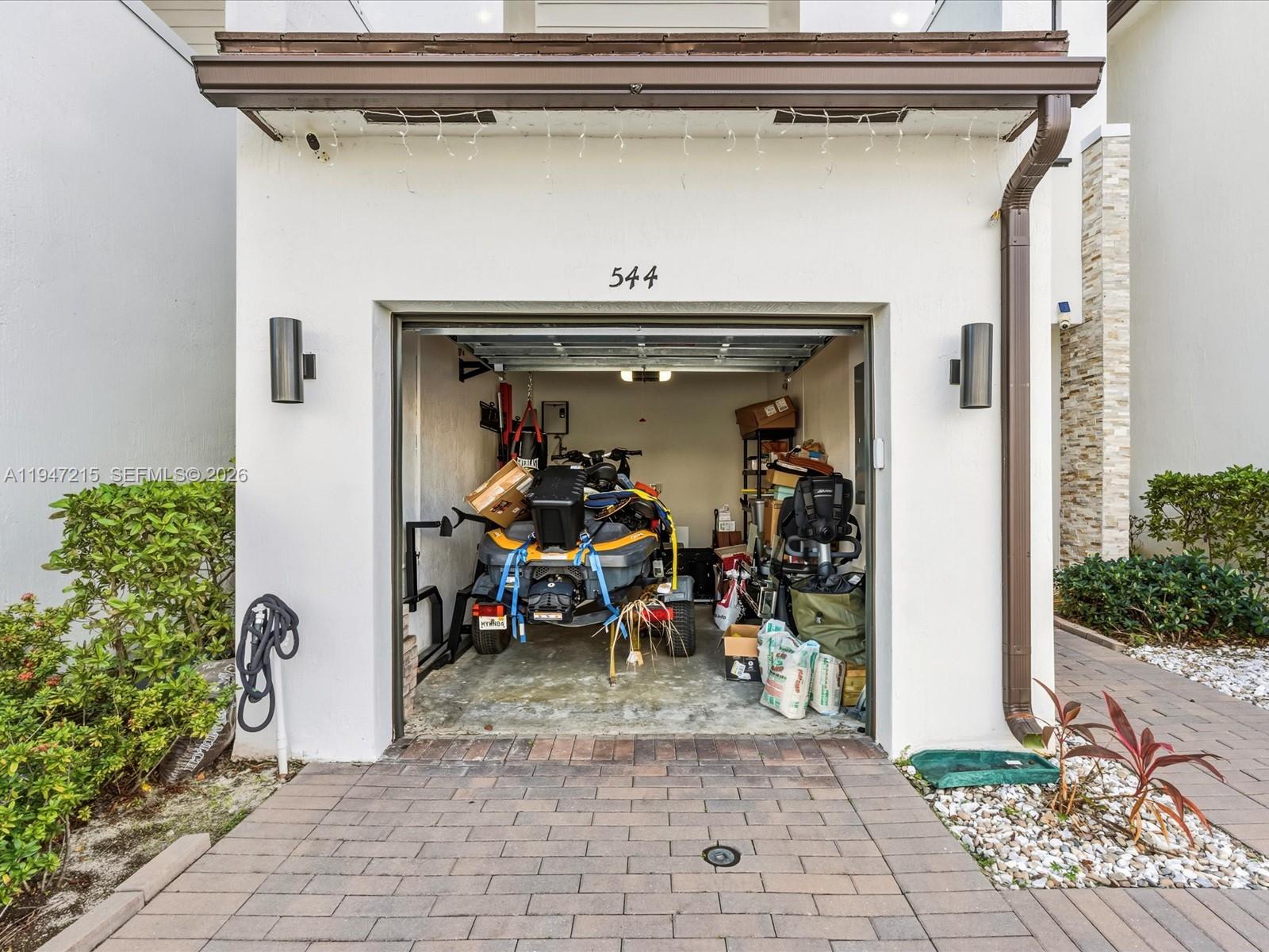 544 Northeast 206th Lane Miami, FL 33179 - Photo 31 of 48 a view of a entryway door of the house